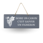 Wooden sign -  Drinking a glass of wine saves a winegrower