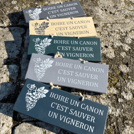 Decorative wooden sign - Drinking a glass of wine saves a winegrower