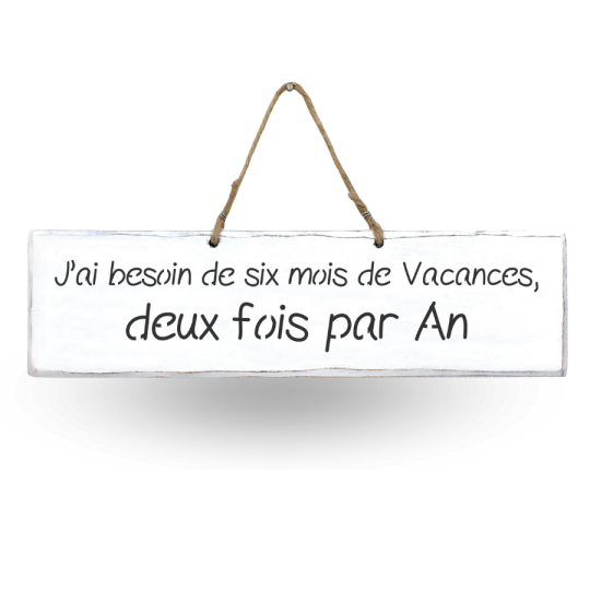 Humorous decorative sign: ‘I need six months' holiday, twice a year’