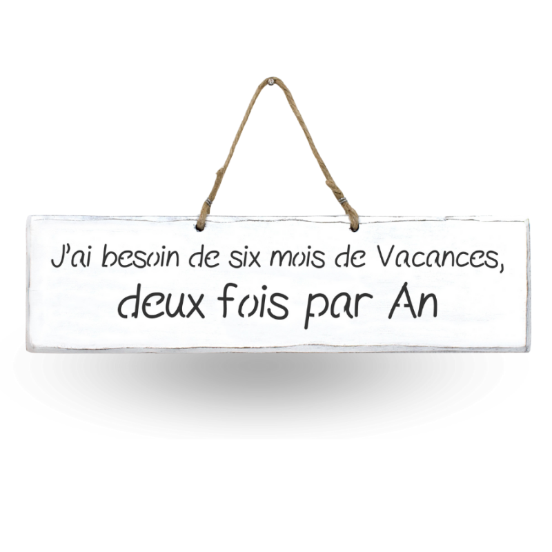 Humorous decorative sign: ‘I need six months' holiday, twice a year’