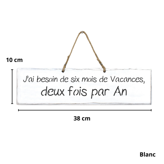 Humorous decorative sign: ‘I need six months' holiday, twice a year’