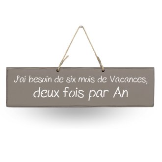 Humorous decorative sign: ‘I need six months' holiday, twice a year’