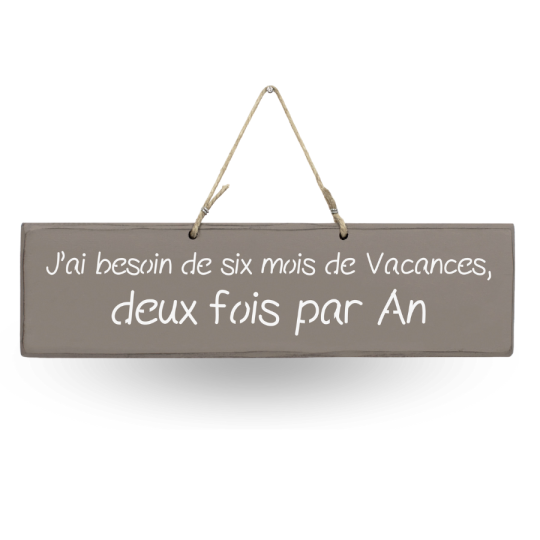 Humorous decorative sign: ‘I need six months' holiday, twice a year’