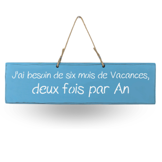 Humorous decorative sign: ‘I need six months' holiday, twice a year’